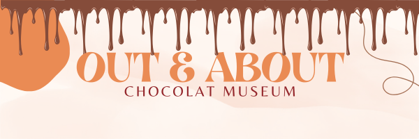 Illustration of chocolate drips at the top of the image, set against a soft peach background. The text in the center reads 'Out & About' in bold orange letters, followed by 'Chocolat Museum' in smaller red letters beneath